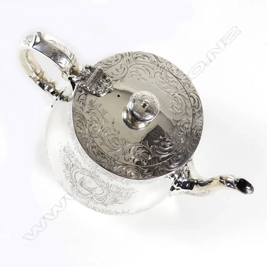 A Victorian silver teapot Image 1++