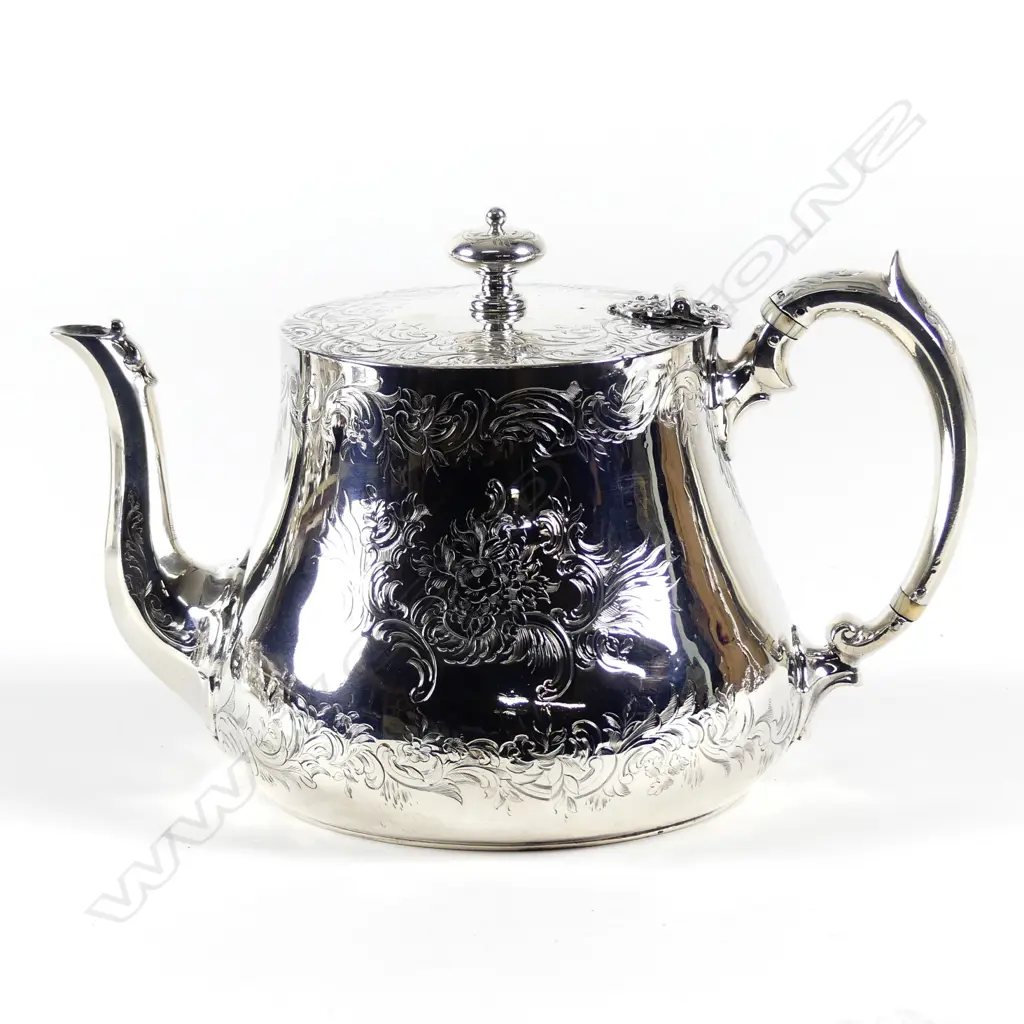 A Victorian silver teapot Image 1++