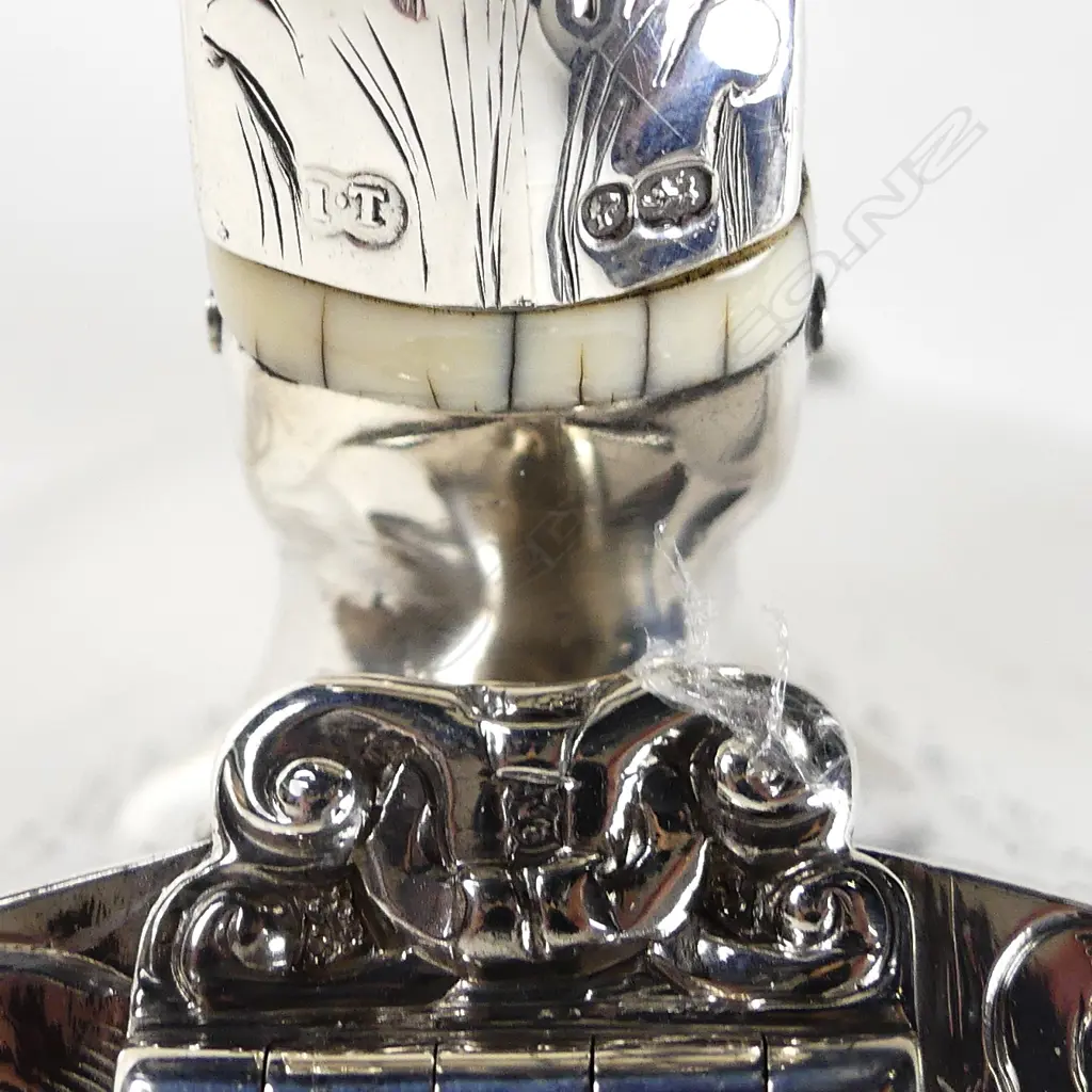 A Victorian silver teapot Image 1++