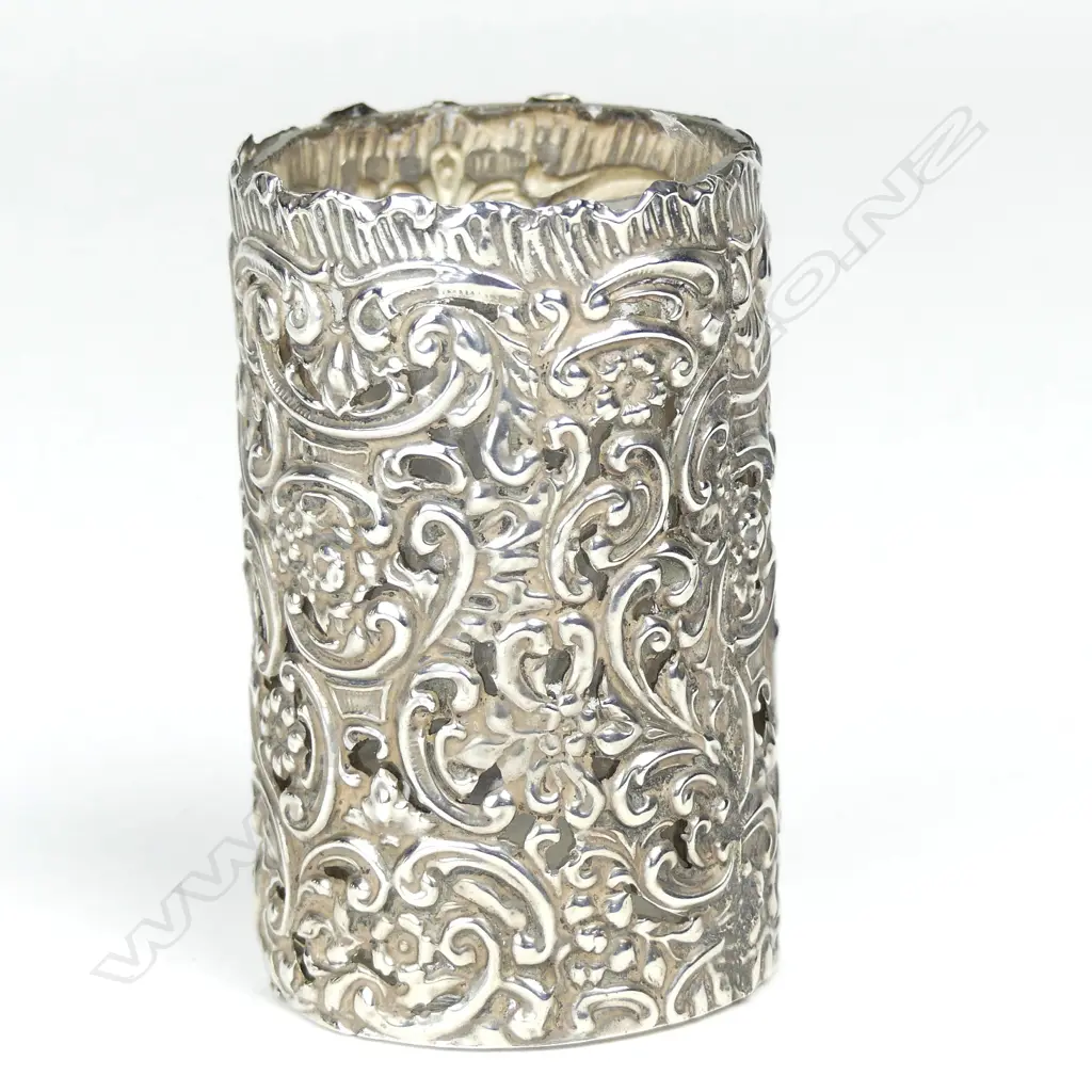 An Edwardian silver cased small glass vase Image 1++