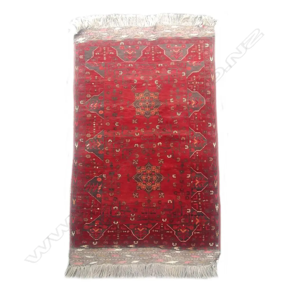 A small hand knotted Afghan rug Image 1++