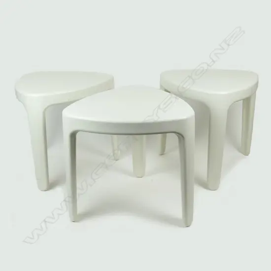 A set of three Magis hard plastic stacking tables