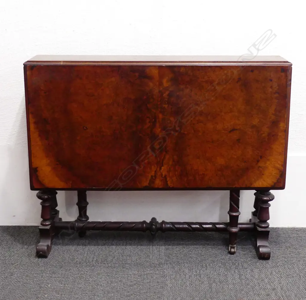 A Victorian figured walnut Sutherland table Image 1++