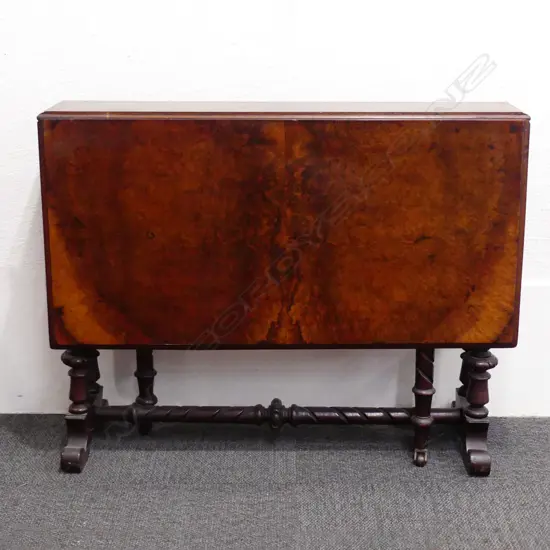 A Victorian figured walnut Sutherland table