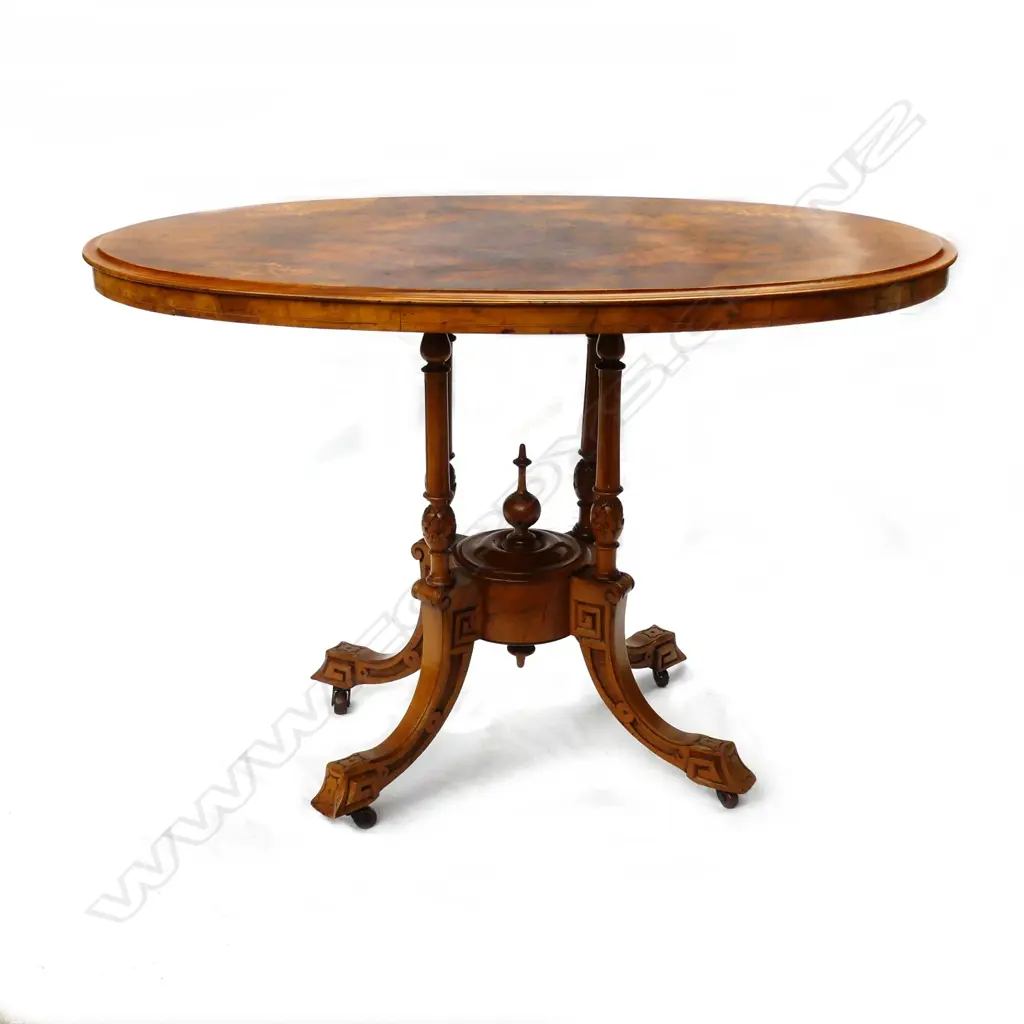 A Victorian walnut occasional table Image 1++