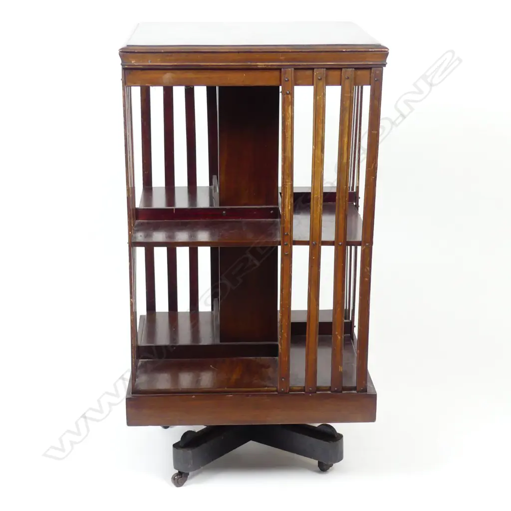 An Edwardian mahogany inlaid revolving bookcase Image 1++