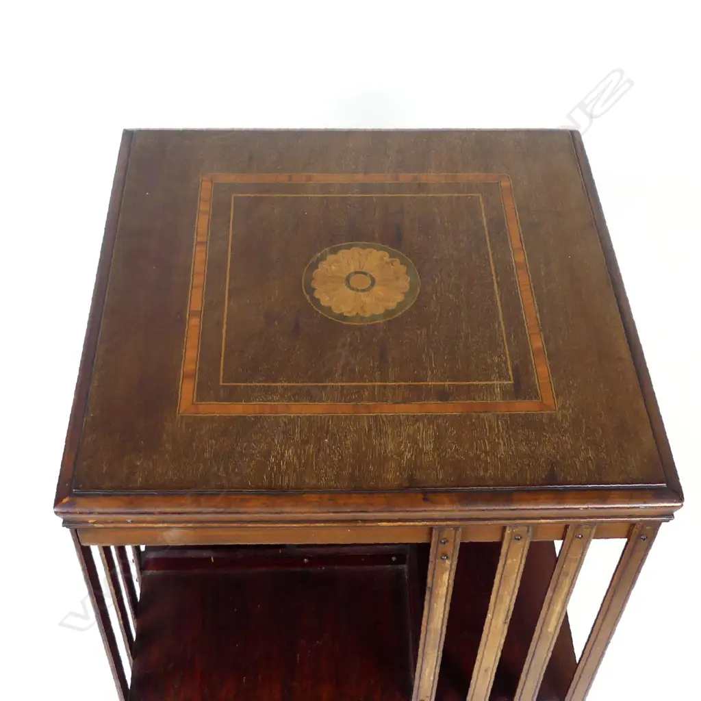 An Edwardian mahogany inlaid revolving bookcase Image 1++