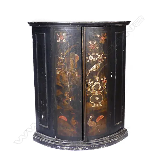 A Georgian style painted corner cabinet