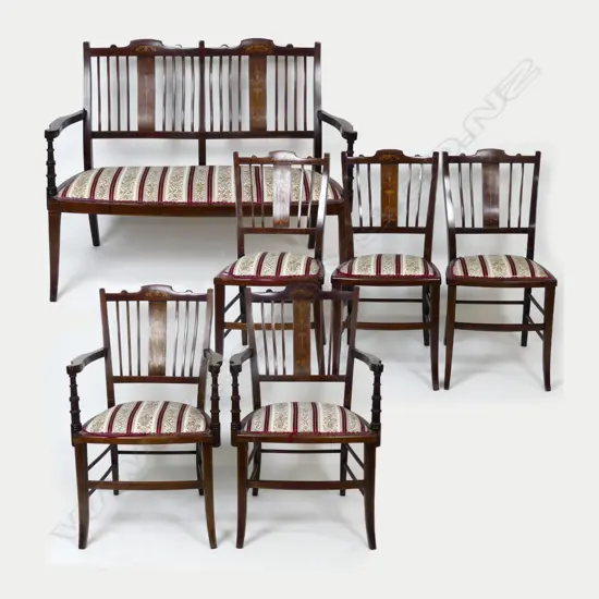 An Edwardian Sheraton revival parlour suite