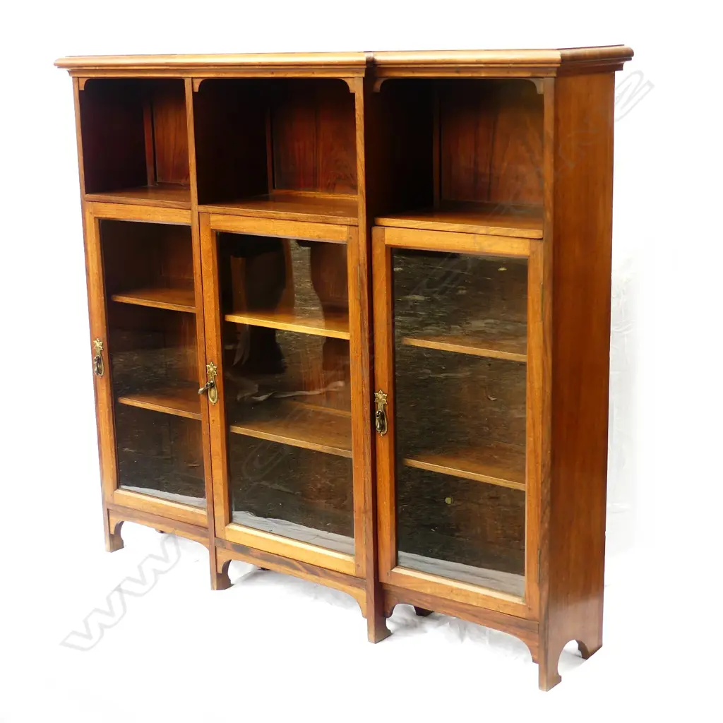 A Victorian black walnut breakfront bookcase Image 1++