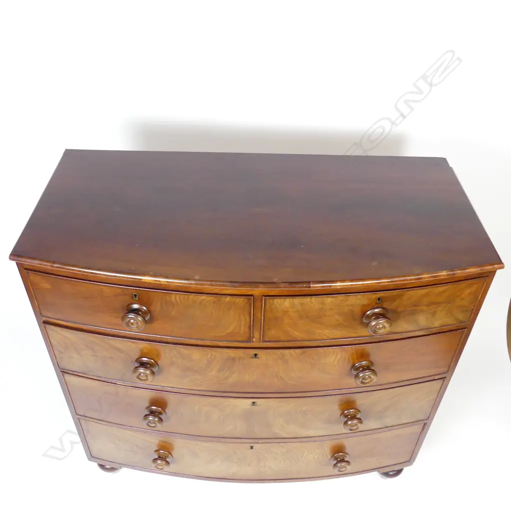 A 19thC mahogany bowfront chest of five drawers Image 1++