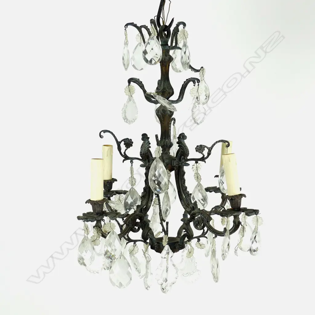A vintage gilt metal and crystal chandelier in the French style Image 1++
