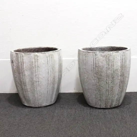 A pair of ovoid greeny-white mottled garden pots