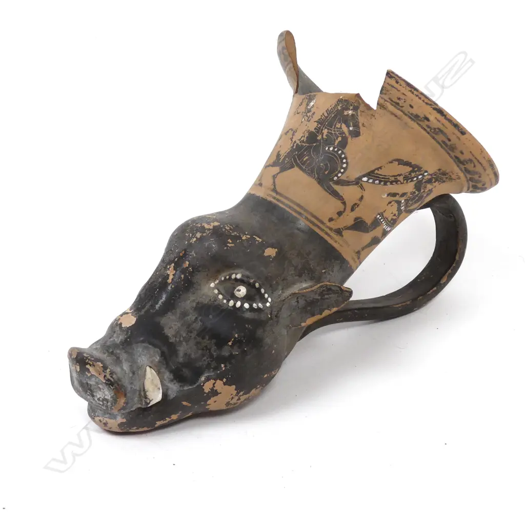 An antique Greek rhyton (drinking-horn) in the shape of a boar's head Image 1++