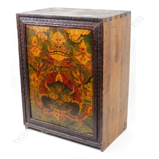 A 19thC demonic painted two-door Tibetan cabinet