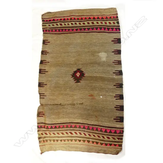 A hand woven Turkish kilim rug