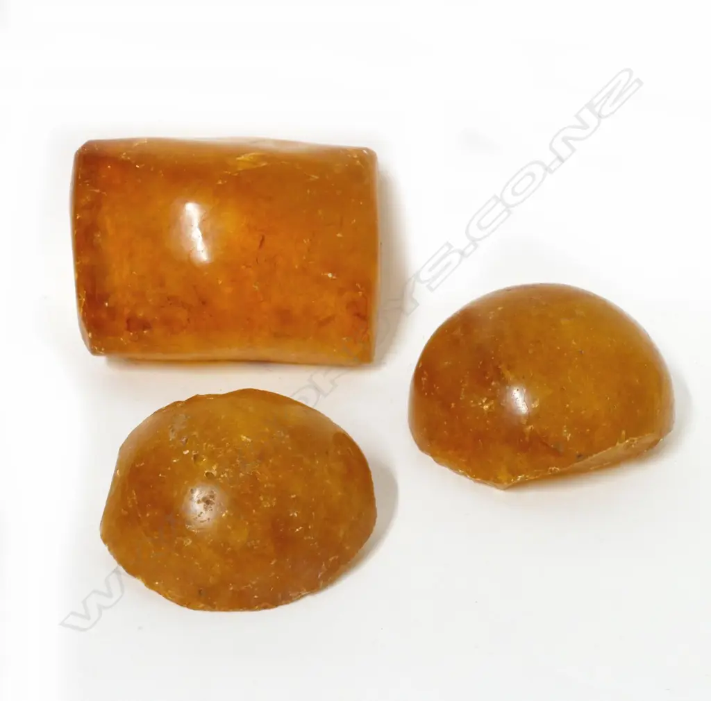 Three pieces of polished kauri gum Image 1++