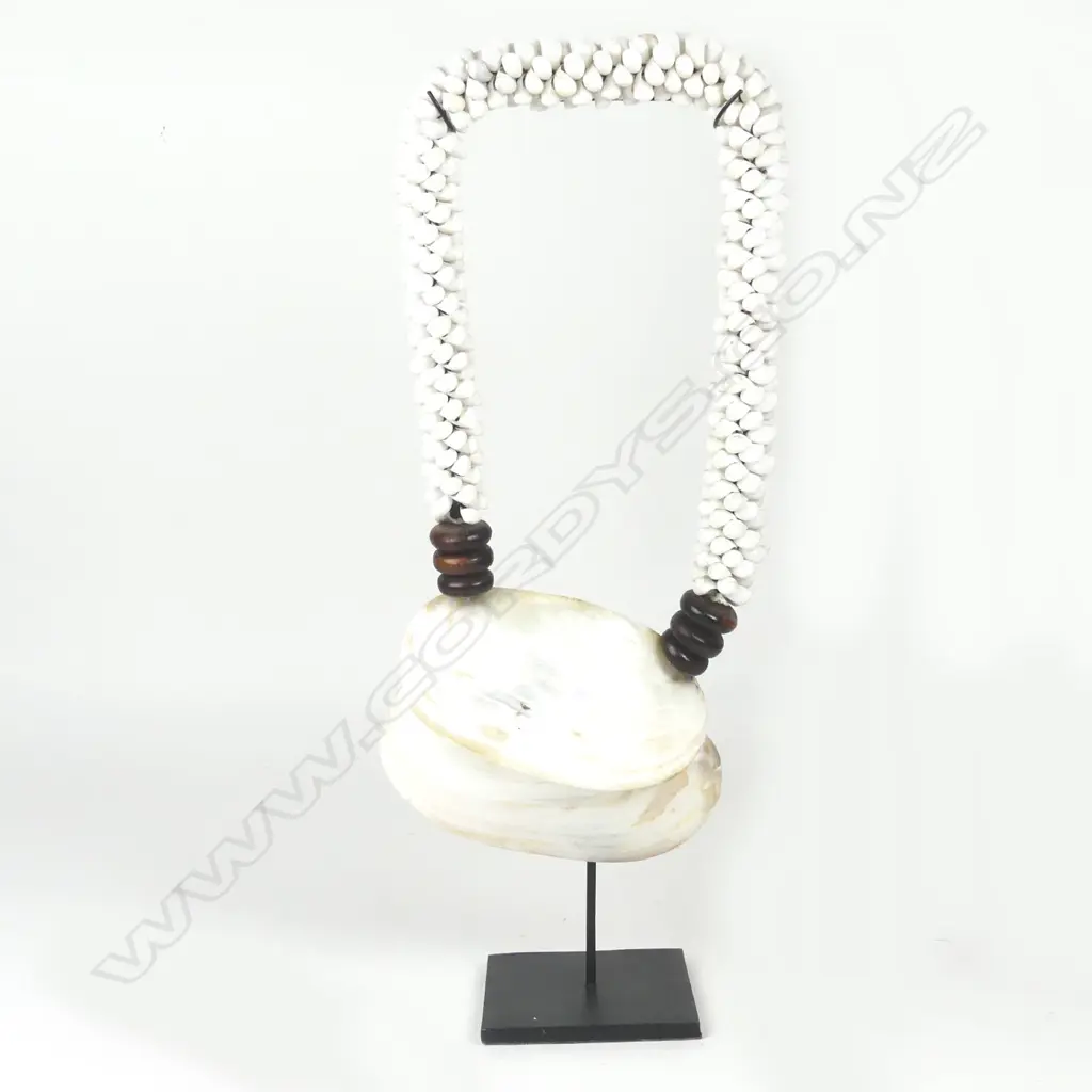 A Pacific mother of pearl and shell lei Image 1++