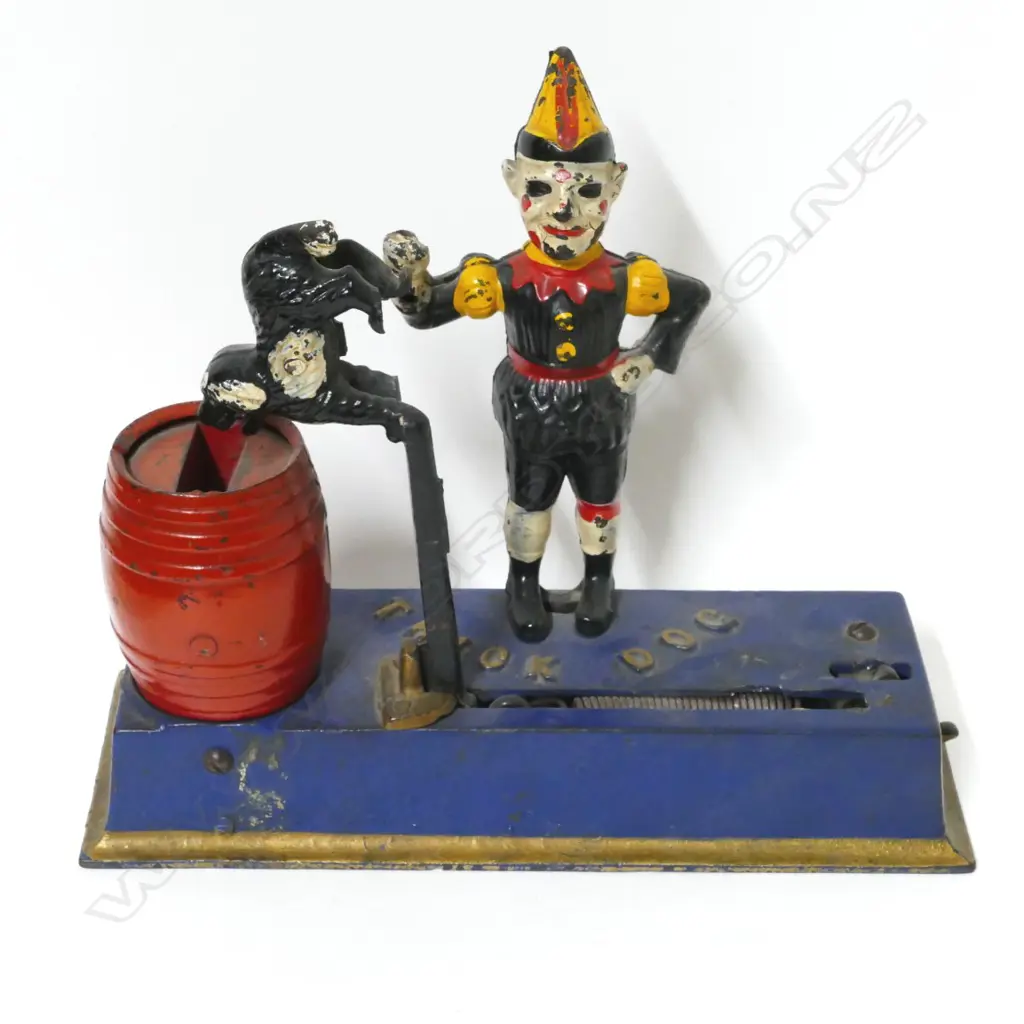 A 'Trick Dog' mechanical money bank Image 1++
