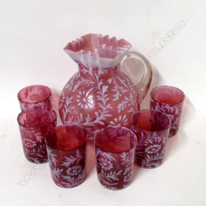 A cranberry glass jug and glasses set Image 1++