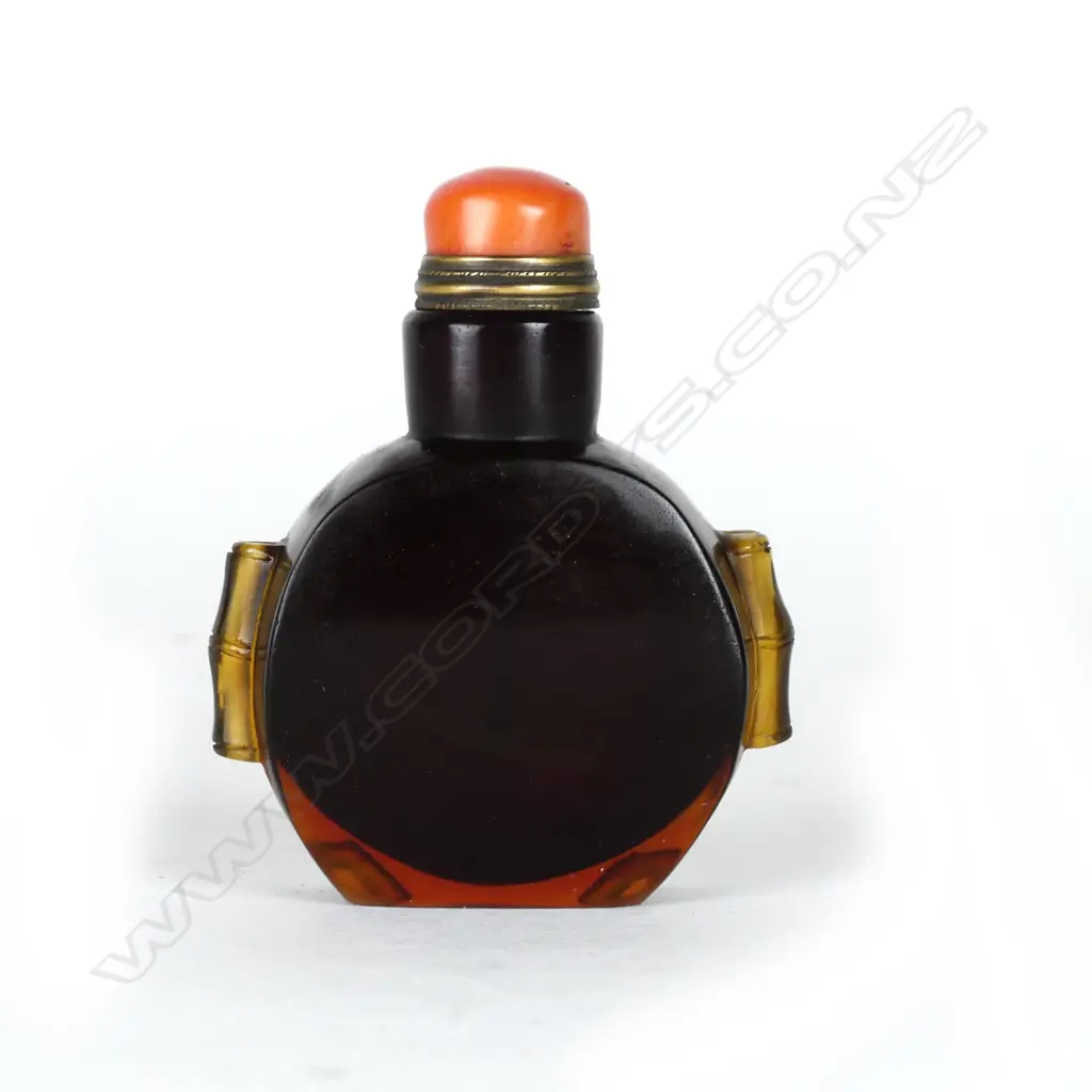 A dark amber Peking glass snuff bottle Image 1++