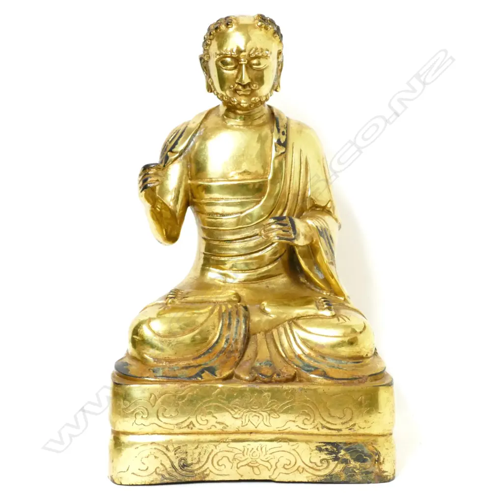 A vintage Chinese gilt bronze figure of a seated monk Image 1++