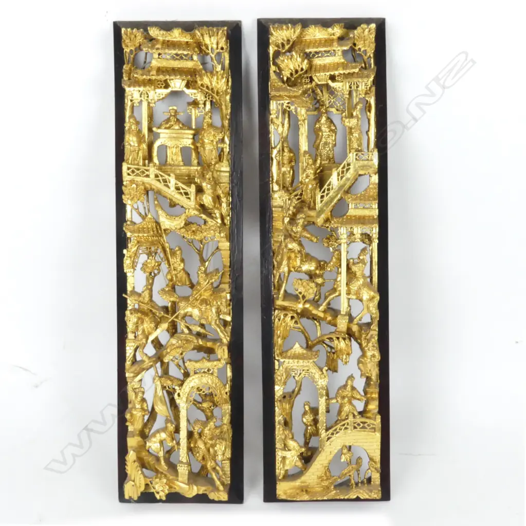A pair of Chinese richly gilded carved and pierced wood panels Image 1++