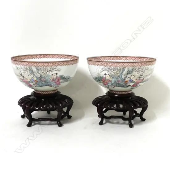 A pair of fine quality Chinese famille rose egg-shell porcelain circular bowls on short feet painted with scenes of young boys playing in a garden
