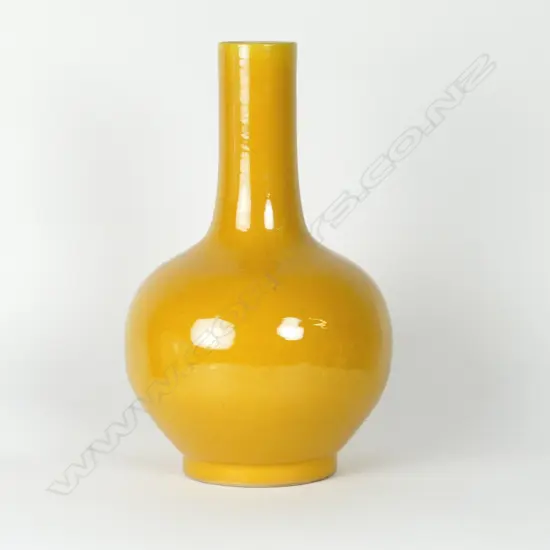 A large Imperial yellow glazed bottle form vase