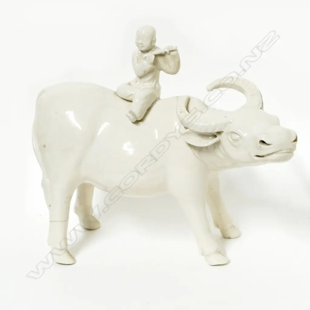 An old blanc-de-chine figure of an ox and boy Image 1++