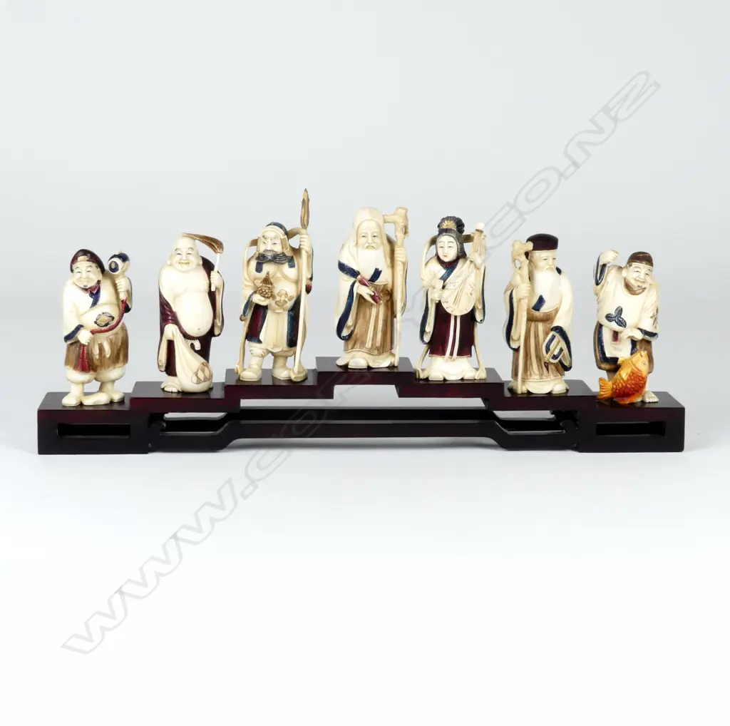 A finely carved and stained ivory Japanese set of the seven gods of Luck and Good Fortune Image 1++