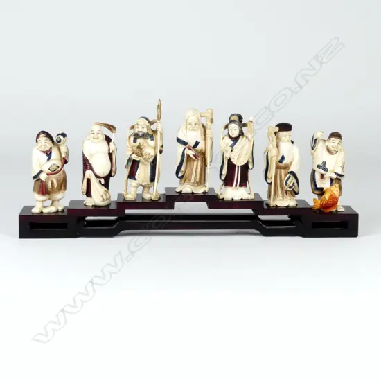 A finely carved and stained ivory Japanese set of the seven gods of Luck and Good Fortune
