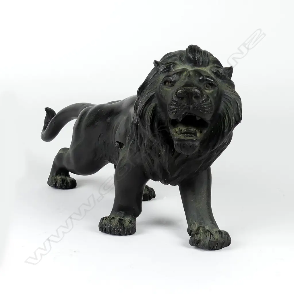 A good Japanese Meiji period bronze of a lion Image 1++