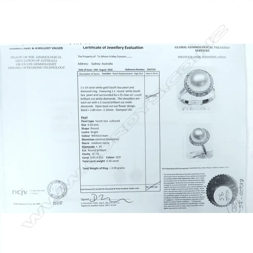 A 14ct white gold pearl and diamond ring Image 1++