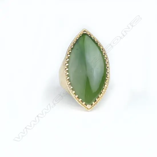 A 9ct gold and greenstone dress ring