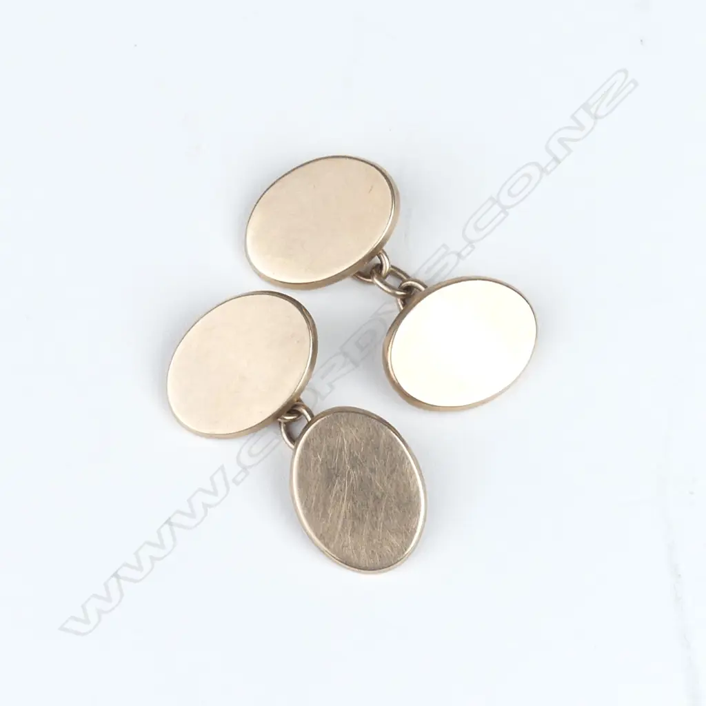 A pair of vintage heavy 9ct. rose gold gent's cufflinks Image 1++