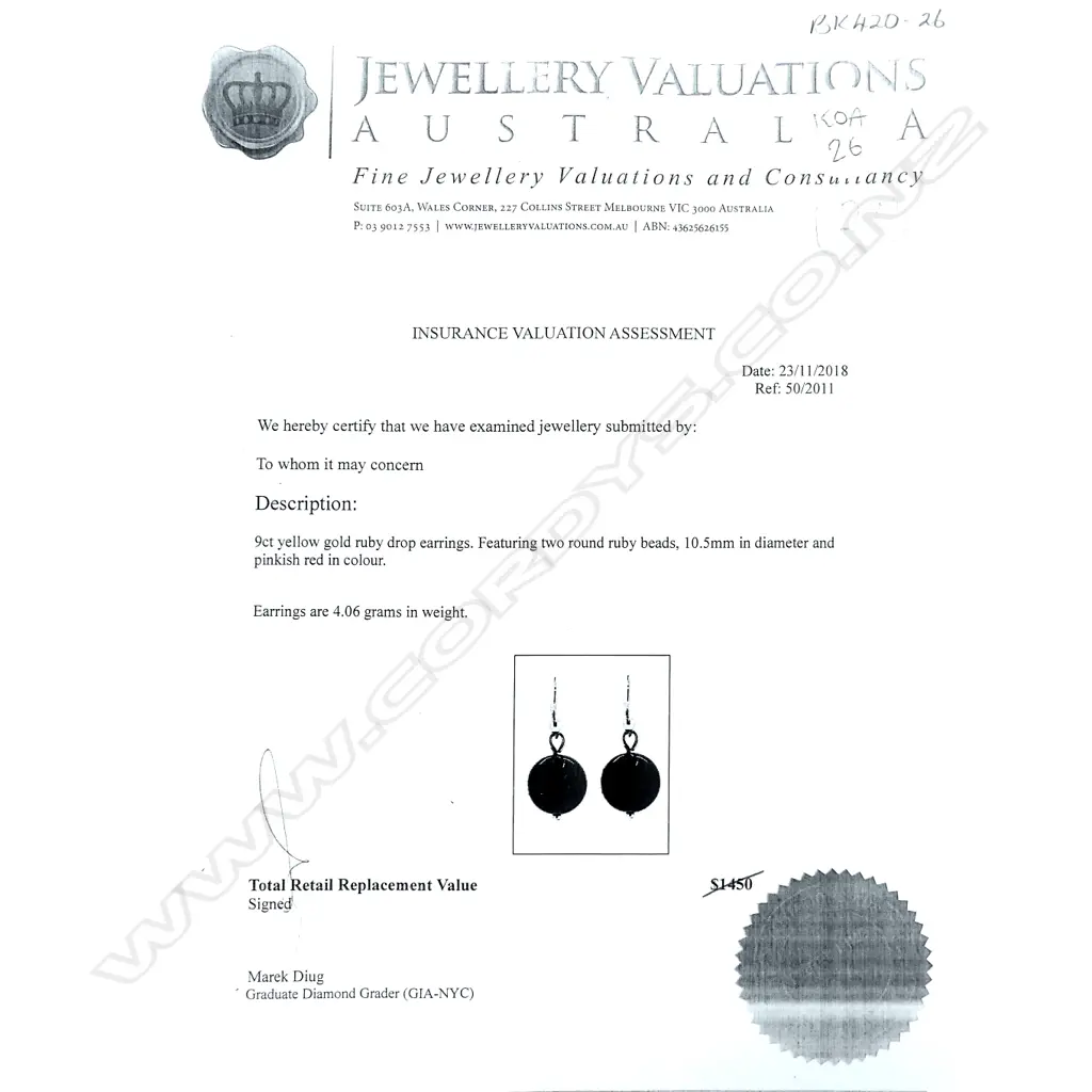 A pair of 9ct yellow gold and ruby earrings Image 1++