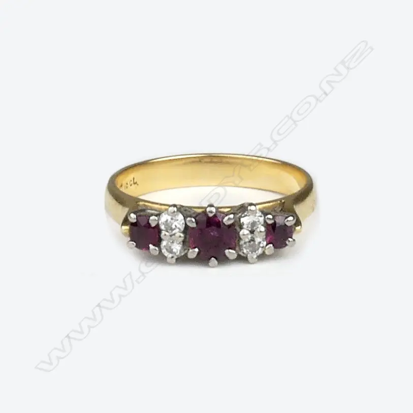 An 18ct. gold ruby and diamond ring Image 1++