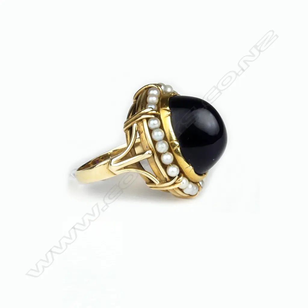 A 14ct. gold amethyst and pearl dress ring Image 1++