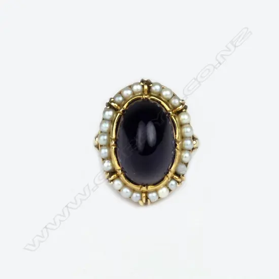 A 14ct. gold amethyst and pearl dress ring