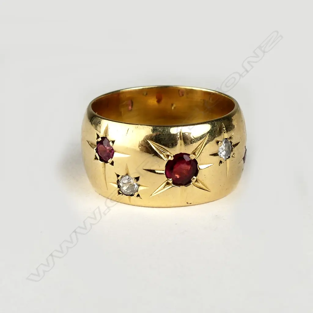 An 18ct gold ruby and diamond ring Image 1++