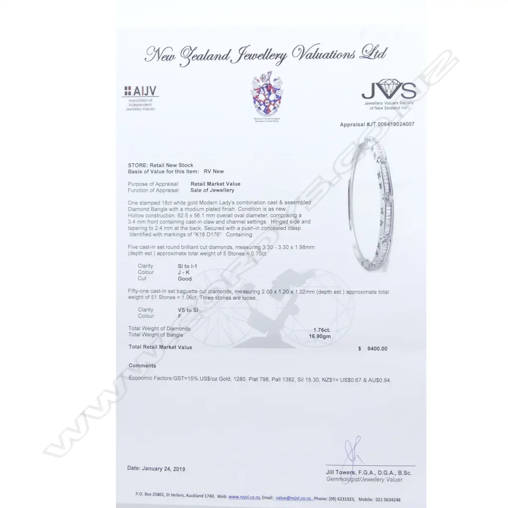 An 18ct white gold and diamond bangle Image 1++
