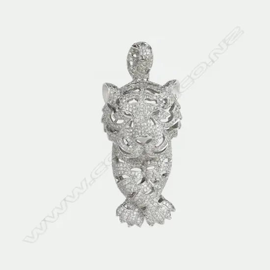 A modern 18ct. white gold and multi-diamond set panther pendant