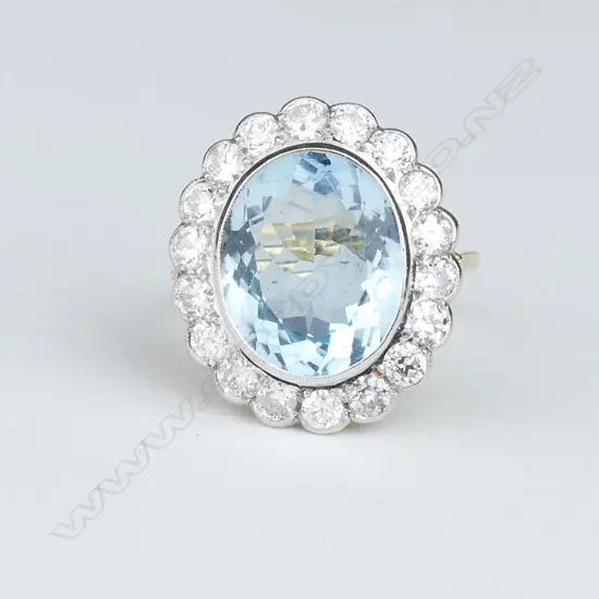An impressive lady's estate large aquamarine and diamond set dress ring