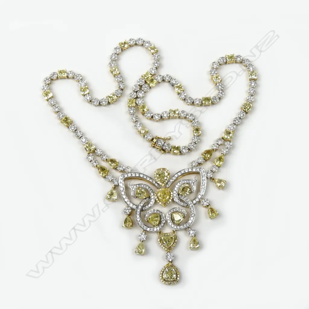 An outstanding necklace of fancy yellow and white diamonds Image 1++