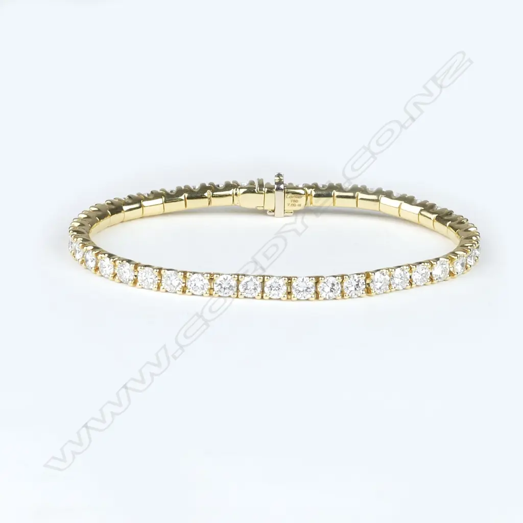 A Cartier 18ct gold and diamond tennis bracelet Image 1++