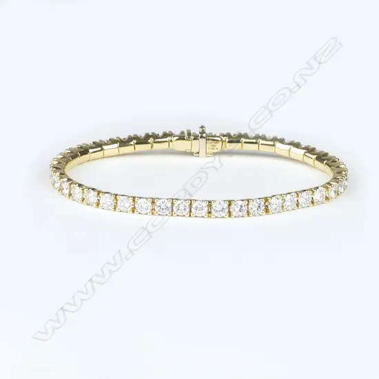 A Cartier 18ct gold and diamond tennis bracelet