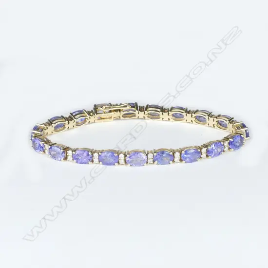 A 14ct gold tanzanite and diamond tennis bracelet