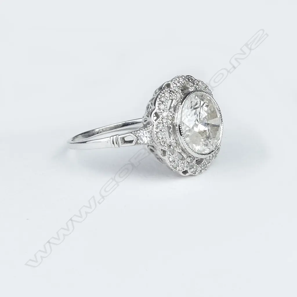 18ct white gold and diamond ring Image 1++