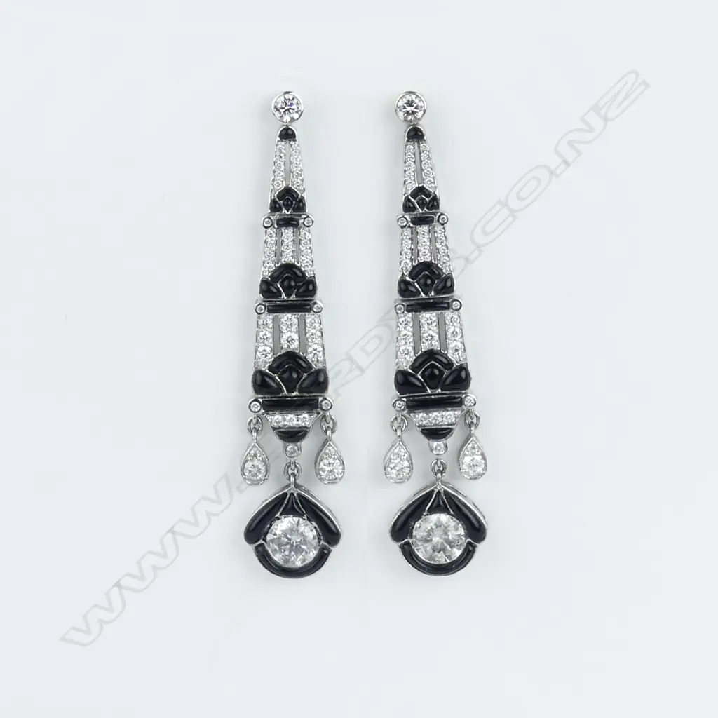 A pair of 9ct white gold diamond and onyx Art Deco style earrings Image 1++